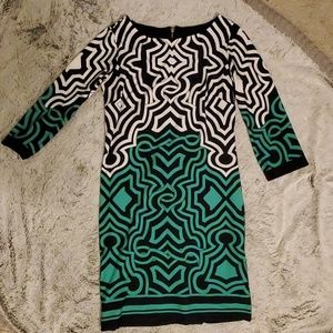 Green, black, and white patterned dress
